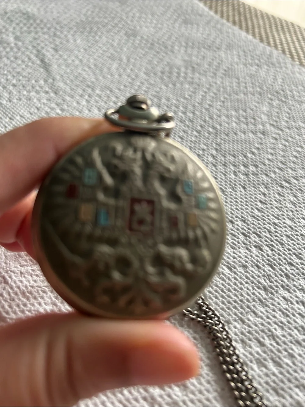 Vintage-Style Silver Pocket Watch with Turquoise and Red Accents
